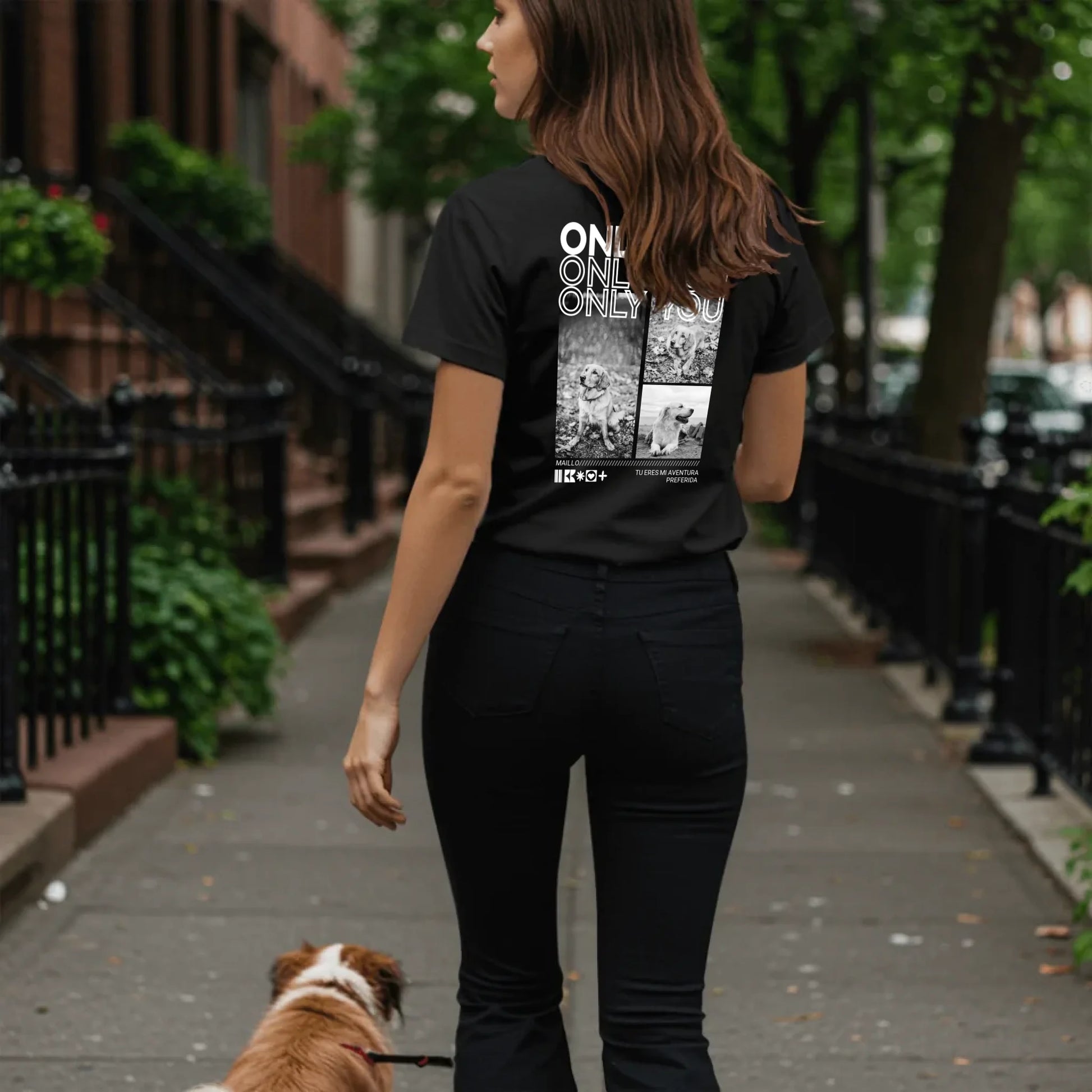 Woman walking dog on sidewalk - Black