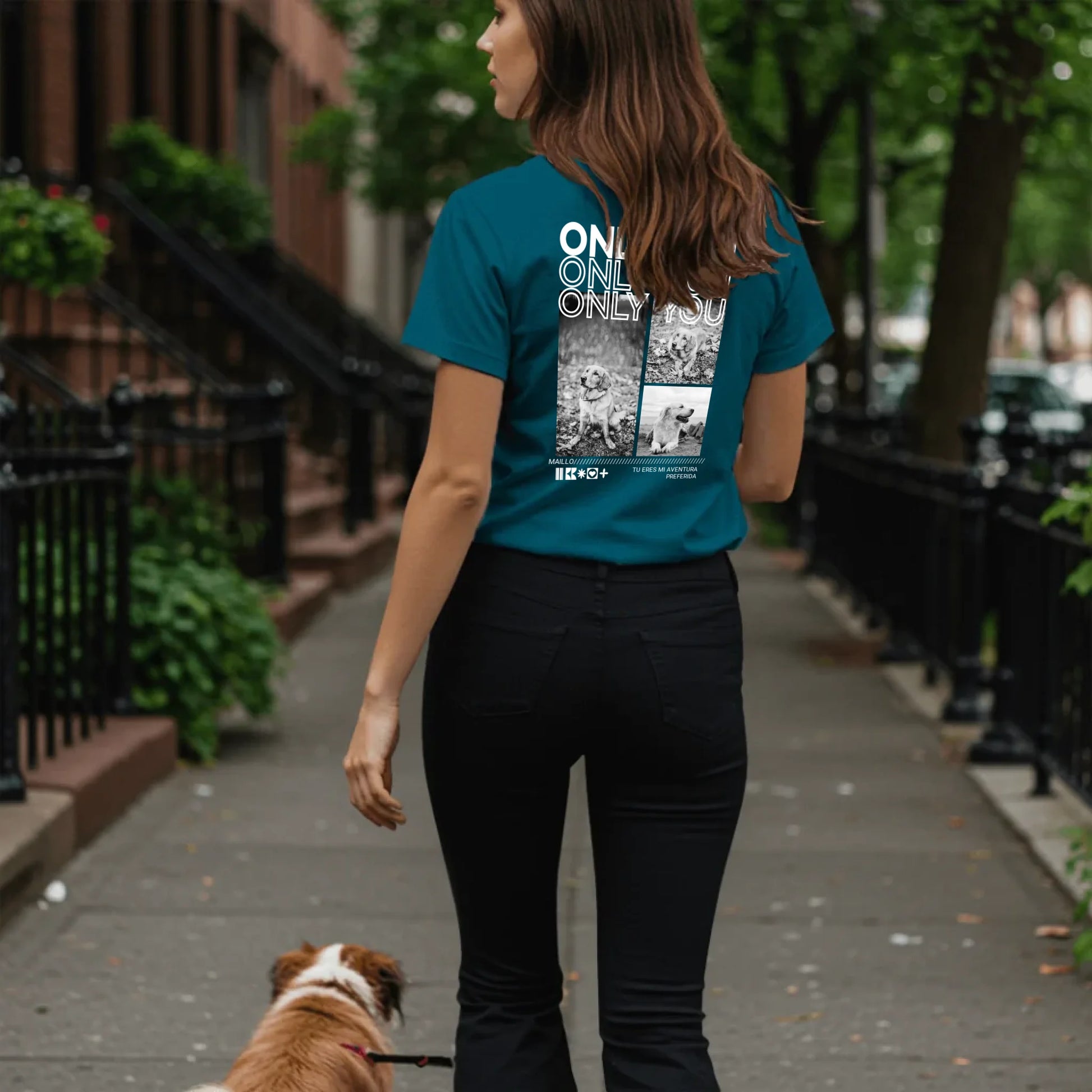 Woman walking dog on sidewalk - Petrol